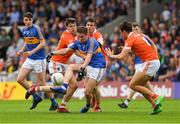 15 July 2017; Bill Maher, supported by Philip Austin, left, of Tipperary in action against, from left, Niall Grimley, Paul Hughes and Stephen Sheridan of Armagh during the GAA Football All-Ireland Senior Championship Round 3B match between Tipperary and Armagh at Semple Stadium in Thurles, Co Tipperary. Photo by Ray McManus/Sportsfile