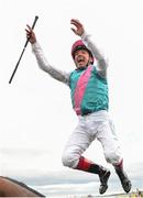 15 July 2017; Frankie Dettori celebrates by jumping off his horse Enable after winning the Darley Irish Oaks during Day 1 of the Darley Irish Oaks Weekend at the Curragh in Kildare. Photo by Eóin Noonan/Sportsfile