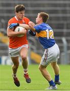 15 July 2017; Niall Grimley of Armagh in action against Brian Fox of Tipperary during the GAA Football All-Ireland Senior Championship Round 3B match between Tipperary and Armagh at Semple Stadium in Thurles, Co Tipperary. Photo by Ray McManus/Sportsfile