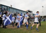 14 March 2012; The St. Andrew’s College team is led out by team captain Gary Fearon. Fr. Godfrey Cup Final, St. Gerard’s School v St. Andrew’s College, Templeville Road, Dublin. Picture credit: Brian Lawless / SPORTSFILE