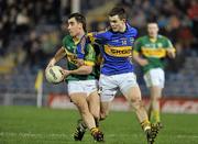 14 March 2012; Jack Sherwood, Kerry, in action against Michael Quinlivan, Tipperary. Cadbury Munster GAA Football Under 21 Championship Semi-Final, Tipperary v Kerry, Semple Stadium, Thurles, Co. Tipperary. Picture credit: Barry Cregg / SPORTSFILE