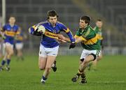 14 March 2012; Liam Boland, Tipperary, in action against Fergal McNamara, Kerry. Cadbury Munster GAA Football Under 21 Championship Semi-Final, Tipperary v Kerry, Semple Stadium, Thurles, Co. Tipperary. Picture credit: Barry Cregg / SPORTSFILE