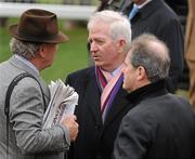 15 March 2012; Former Minister for Finance and EU Commissioner Charlie McCreevey in conversation with trainer Edward O'Grady, left, and JP McManus at the Cheltenham Festival. Cheltenham Racing Festival, Prestbury Park, Cheltenham, England. Picture credit: Brendan Moran / SPORTSFILE