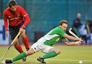 15 March 2012; Michael Darling, Ireland, in action against Andres Fuenzalida, Chile. Men’s 2012 Olympic Qualifying Tournament, Ireland v Chile, National Hockey Stadium, UCD, Belfield, Dublin. Picture credit: Barry Cregg / SPORTSFILE