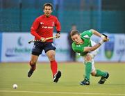 15 March 2012; David Ames, Ireland, in action against Alexis Berzcely, Chile. Men’s 2012 Olympic Qualifying Tournament, Ireland v Chile, National Hockey Stadium, UCD, Belfield, Dublin. Picture credit: Barry Cregg / SPORTSFILE