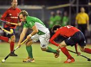 15 March 2012; Timothy Cockram, Ireland, in action against Ricardo Achondo, Chile. Men’s 2012 Olympic Qualifying Tournament, Ireland v Chile, National Hockey Stadium, UCD, Belfield, Dublin. Picture credit: Barry Cregg / SPORTSFILE