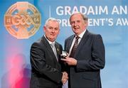 16 March 2012; Dr. Con Murphy, Cork, is presented with his GAA President's Award for 2012 by Uachtarán Cumann Lúthchleas Gael Criostóir Ó Cuana at the GAA Presidents Awards 2012. Dr. Con’s name is synonymous with GAA in Cork and he has been the county’s team doctor since 1976. Apart from the medical side he has been everything from a selector to counselor and confidant for generations of players, and the regard in which he’s held is unrivalled in the game. GAA Presidents Awards 2012, Croke Park, Dublin. Picture credit: Brian Lawless / SPORTSFILE