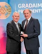 16 March 2012; Dr. Con Murphy, Cork, is presented with his GAA President's Award for 2012 by Uachtarán Cumann Lúthchleas Gael Criostóir Ó Cuana at the GAA Presidents Awards 2012. Dr. Con’s name is synonymous with GAA in Cork and he has been the county’s team doctor since 1976. Apart from the medical side he has been everything from a selector to counselor and confidant for generations of players, and the regard in which he’s held is unrivalled in the game. GAA Presidents Awards 2012, Croke Park, Dublin. Picture credit: Brian Lawless / SPORTSFILE