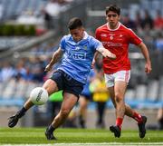 16 July 2017; Ross McGarry of Dublin kicks a point under pressure fron Eoghan Callaghan of Louth during the Electric Ireland Leinster GAA Football Minor Championship Final match between Dublin and Louth at Croke Park in Dublin. Photo by Ray McManus/Sportsfile