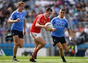 16 July 2017; Ben Mooney of Louth in action against Neil Matthews, right, and Donal Ryan of Dublin during the Electric Ireland Leinster GAA Football Minor Championship Final match between Dublin and Louth at Croke Park in Dublin. Photo by Ray McManus/Sportsfile
