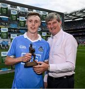 16 July 2017; Kieran Kennedy of Dublin is presented with the Electric Ireland man of the match award by Pat O'Doherty, Chief Executive of ESB, after the Electric Ireland Leinster GAA Football Minor Championship Final match between Dublin and Louth at Croke Park in Co. Dublin. Photo by Ray McManus/Sportsfile