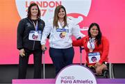16 July 2017; Orla Barry, left, receives her silver medal after she finished second in the F57 Women's Discus with Nassima Saifi, Gold, middle, and Floralia Estrada Bernal, Bronze, right, during day 3 of the 2017 Para Athletics World Championships at the Olympic Stadium in London. Photo by Luc Percival/Sportfile