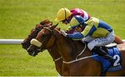 16 July 2017; Surrounding, 2, with Shane Foley up, race alongside eventual second-place-finisher Stormy Belle, with Pat Smullen up, on their way to winning the Irish Stallion Farms EBF Fillies Handicap during Day 2 of the Darley Irish Oaks Weekend at the Curragh in Kildare. Photo by Cody Glenn/Sportsfile