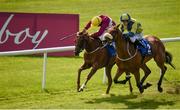 16 July 2017; Surrounding, right, with Shane Foley up, race alongside eventual second-place-finisher Stormy Belle, with Pat Smullen up, on their way to winning the Irish Stallion Farms EBF Fillies Handicap during Day 2 of the Darley Irish Oaks Weekend at the Curragh in Kildare. Photo by Cody Glenn/Sportsfile