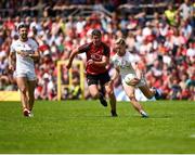 16 July 2017; Niall Sludden of Tyrone in action against  Peter Turley of Down during the Ulster GAA Football Senior Championship Final match between Tyrone and Down at St Tiernach's Park in Clones, Co. Monaghan. Photo by Philip Fitzpatrick/Sportsfile