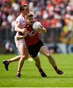 16 July 2017; Conor Maginn of Down in action against Ronan McNamee of Tyrone during the Ulster GAA Football Senior Championship Final match between Tyrone and Down at St Tiernach's Park in Clones, Co. Monaghan. Photo by Philip Fitzpatrick/Sportsfile