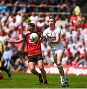 16 July 2017; Colm Cavanagh of Tyrone in action against Connaire Harrison of Down during the Ulster GAA Football Senior Championship Final match between Tyrone and Down at St Tiernach's Park in Clones, Co. Monaghan. Photo by Philip Fitzpatrick/Sportsfile
