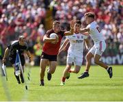 16 July 2017; David McKibbin of Down in action against Niall Sludden of Tyrone during the Ulster GAA Football Senior Championship Final match between Tyrone and Down at St Tiernach's Park in Clones, Co. Monaghan. Photo by Philip Fitzpatrick/Sportsfile