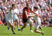 16 July 2017; Caolan Mooney of Down in action against David Mulgrew and Matthew Donnelly of Tyrone during the Ulster GAA Football Senior Championship Final match between Tyrone and Down at St Tiernach's Park in Clones, Co. Monaghan. Photo by Oliver McVeigh/Sportsfile