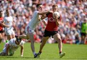 16 July 2017; Caolan Mooney of Down in action against David Mulgrew of Tyrone during the Ulster GAA Football Senior Championship Final match between Tyrone and Down at St Tiernach's Park in Clones, Co. Monaghan. Photo by Oliver McVeigh/Sportsfile
