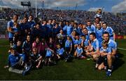 16 July 2017; The victorious Dublin team, and family members and friends, with the Delaney Cup after the Leinster GAA Football Senior Championship Final match between Dublin and Kildare at Croke Park in Dublin. Photo by Ray McManus/Sportsfile