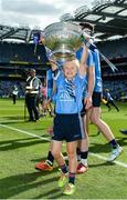 16 July 2017; Kyah O'Reilly, age 8, with the Delaney Cup following the Leinster GAA Football Senior Championship Final match between Dublin and Kildare at Croke Park in Dublin. Photo by Seb Daly/Sportsfile