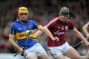 11 March 2012; Pa Bourke, Tipperary, in action against Timmy Hammersley, Galway. Allianz Hurling League Division 1A, Tipperary v Galway, Semple Stadium, Thurles, Co. Tipperary. Picture credit: Brian Lawless / SPORTSFILE