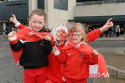 17 March 2012; Loughgiel Shamrocks supporters, from left, Bronagh Roddy, age 5, Chloe Parker, age 10, and Orla Roddy, age 3, ahead of the game. AIB GAA Hurling All-Ireland Senior Club Championship Final, Coolderry, Offaly, v Loughgiel Shamrocks, Antrim. Croke Park, Dublin. Picture credit: Stephen McCarthy / SPORTSFILE