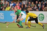 17 March 2012; Eugene Magee, Ireland, in action against Ikmar Mohd Nor Mohd Madzli, Malaysia. Men’s 2012 Olympic Qualifying Tournament, Ireland v Malaysia, National Hockey Stadium, UCD, Belfield, Dublin. Picture credit: Barry Cregg / SPORTSFILE