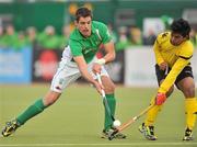 17 March 2012; John Jermyn, Ireland, in action against Fitri Saari Mohd, Malaysia. Men’s 2012 Olympic Qualifying Tournament, Ireland v Malaysia, National Hockey Stadium, UCD, Belfield, Dublin. Picture credit: Barry Cregg / SPORTSFILE