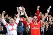 17 March 2012; Loughgiel Shamrocks joint captains Damian Quinn, left, and Johnny Campbell lift the Tommy Moore Cup. AIB GAA Hurling All-Ireland Senior Club Championship Final, Coolderry, Offaly, v Loughgiel Shamrocks, Antrim. Croke Park, Dublin. Picture credit: Stephen McCarthy / SPORTSFILE