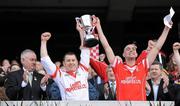 17 March 2012; Loughgiel Shamrocks joint captains Damian Quinn, left, and Johnny Campbell lift the Tommy Moore Cup. AIB GAA Hurling All-Ireland Senior Club Championship Final, Coolderry, Offaly, v Loughgiel Shamrocks, Antrim, Croke Park, Dublin. Picture credit: Pat Murphy / SPORTSFILE