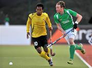 17 March 2012; Andrew McConnell, Ireland, in action against Faizal Saari, Malaysia. Men’s 2012 Olympic Qualifying Tournament, Ireland v Malaysia, National Hockey Stadium, UCD, Belfield, Dublin. Picture credit: Barry Cregg / SPORTSFILE