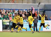 17 March 2012; Fiqri Nabil Mohd Noor, far left, Malaysia, celebrates with his team-mates after scoring his side's first goal. Men’s 2012 Olympic Qualifying Tournament, Ireland v Malaysia, National Hockey Stadium, UCD, Belfield, Dublin. Picture credit: Barry Cregg / SPORTSFILE