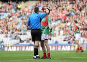 17 March 2012; Tom McHugh, Garrycastle, receives a red card from referee Rory Hickey. AIB GAA Football All-Ireland Senior Club Championship Final, Crossmaglen Rangers, Armagh, v Garrycastle, Westmeath. Croke Park, Dublin. Picture credit: Stephen McCarthy / SPORTSFILE