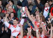 17 March 2012; Loughgiel Shamrocks joint captains Damian Quinn, left, and Johnny Campbell lift the Tommy Moore Cup. AIB GAA Hurling All-Ireland Senior Club Championship Final, Coolderry, Offaly, v Loughgiel Shamrocks, Antrim, Croke Park, Dublin. Picture credit: Ray McManus / SPORTSFILE