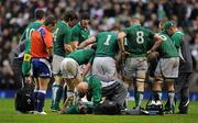 17 March 2012; Ireland's Rob Kearney has his eye attended to by team doctor Dr. Eanna Falvey after an alleged gouging incident during the first half. RBS Six Nations Rugby Championship, England v Ireland, Twickenham Stadium, London, England. Picture credit: Brendan Moran / SPORTSFILE