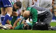 17 March 2012; Ireland's Rob Kearney has his eye attended to by team doctor Dr. Eanna Falvey after an alleged gouging incident during the first half. RBS Six Nations Rugby Championship, England v Ireland, Twickenham Stadium, London, England. Picture credit: Brendan Moran / SPORTSFILE