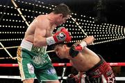 17 March 2012; Matthew Macklin, left, Ireland, exchanges punches with Sergio Martinez, Argentina, during their WBC Middleweight Title Fight. Martinez won via 11th round TKO. Madison Square Garden, New York, USA. Picture credit: Ed Mulholland / SPORTSFILE