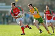 18 March 2012; Andy Moran, Mayo, in action against Leo McLoone, Donegal. Allianz Football League, Division 1, Round 5, Donegal v Mayo, Fr. Tierney Park, Ballyshannon, Donegal. Picture credit: Oliver McVeigh / SPORTSFILE