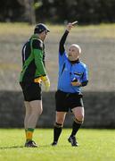 18 March 2012; Referee Marty Duffy issues a yellow card to Paul Durcan, Donegal. Allianz Football League, Division 1, Round 5, Donegal v Mayo, Fr. Tierney Park, Ballyshannon, Donegal. Picture credit: Oliver McVeigh / SPORTSFILE