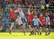 18 March 2012; Michael Dara MacAuley, Dublin, in action against Kalum King, left, and Ambrose Rogers, Down. Allianz Football League, Division 1, Round 5, Down v Dublin, Pairc Esler, Newry, Co. Down. Photo by Sportsfile