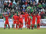 18 March 2012; Korea players celebrate after they scored a goal tin the final seconds of the game. Men’s 2012 Olympic Qualifying Tournament Final, Ireland v Korea. National Hockey Stadium, UCD, Belfield, Dublin. Picture credit: Barry Cregg / SPORTSFILE