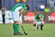 18 March 2012; A dejected Ireland captain Ronan Gormley, left, and William Geoffrey McCabe, right, after the game. Men’s 2012 Olympic Qualifying Tournament Final, Ireland v Korea. National Hockey Stadium, UCD, Belfield, Dublin. Picture credit: Barry Cregg / SPORTSFILE