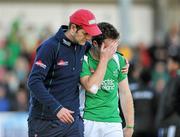 18 March 2012; A dejected John Jackson, Ireland, is comforted by team manager Paul Revington after the game. Men’s 2012 Olympic Qualifying Tournament Final, Ireland v Korea. National Hockey Stadium, UCD, Belfield, Dublin. Picture credit: Barry Cregg / SPORTSFILE