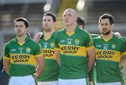 18 March 2012; Kieran Donaghy, Kerry, 14, and team-mates, including Aidan O'Mahony, 3, Bryan Sheehan, 9, and Paul Galvin, 10, during a minute silence ahead of the game, in memory of his late father Oliver Donaghy. Allianz Football League, Division 1, Round 5, Cork v Kerry, Pairc Ui Chaoimh, Cork. Picture credit: Stephen McCarthy / SPORTSFILE