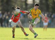 18 March 2012; Patrick McBrearty, Donegal, in action against Ger Cafferkey, Mayo. Allianz Football League, Division 1, Round 5, Donegal v Mayo, Fr. Tierney Park, Ballyshannon, Donegal. Picture credit: Oliver McVeigh / SPORTSFILE