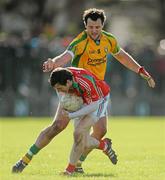 18 March 2012; Keith Higgins, Mayo, in action against Michael Murphy, Donegal. Allianz Football League, Division 1, Round 5, Donegal v Mayo, Fr. Tierney Park, Ballyshannon, Donegal. Picture credit: Oliver McVeigh / SPORTSFILE