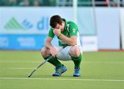 18 March 2012; A dejected John Jackson, Ireland, after the game. Men’s 2012 Olympic Qualifying Tournament Final, Ireland v Korea. National Hockey Stadium, UCD, Belfield, Dublin. Picture credit: Barry Cregg / SPORTSFILE
