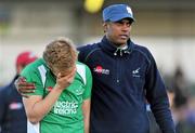 18 March 2012; A dejected Michael Watt, Ireland, is comforted by assistant coach Arul Anthoni, right, after the game. Men’s 2012 Olympic Qualifying Tournament Final, Ireland v Korea. National Hockey Stadium, UCD, Belfield, Dublin. Picture credit: Barry Cregg / SPORTSFILE